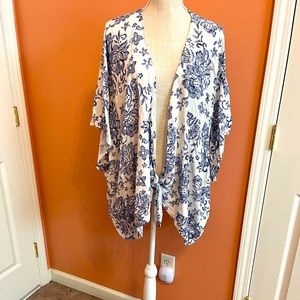 Eyeshadow brand cotton tie front shrug in white with blue flowers size 1X.